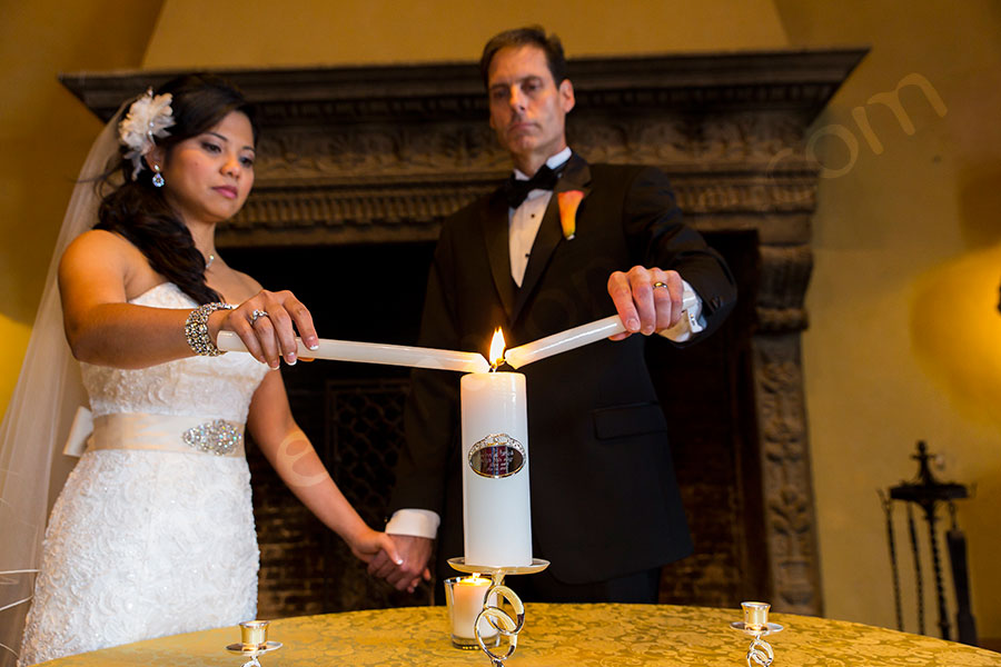 Lighting up the wedding candles of unity