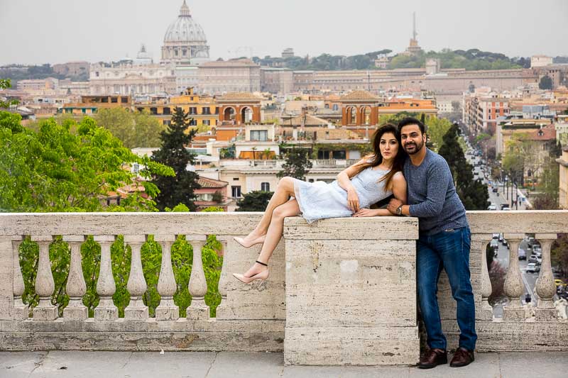 Anniversary photoshoot celebrated on the terrace overlooking the beautiful Rome skyline