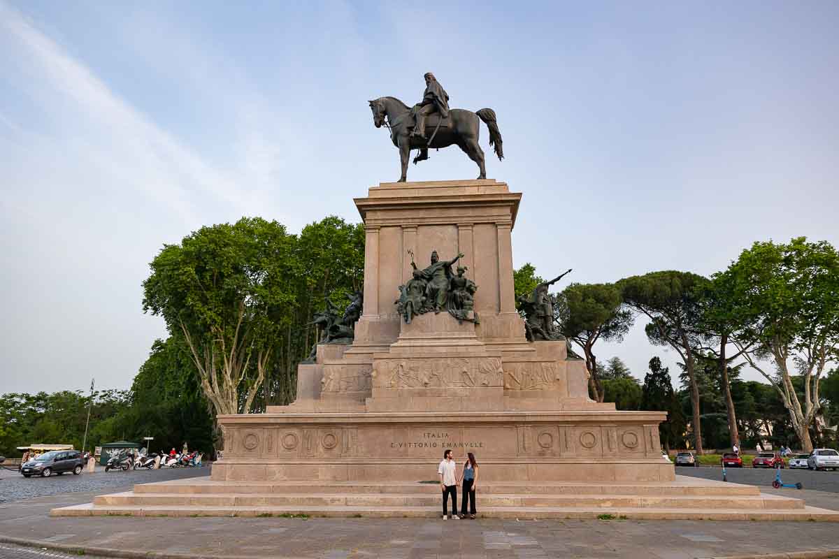 Taking pictures underneath the equestrian statue of Garibaldi found in Piazzale Garibaldi