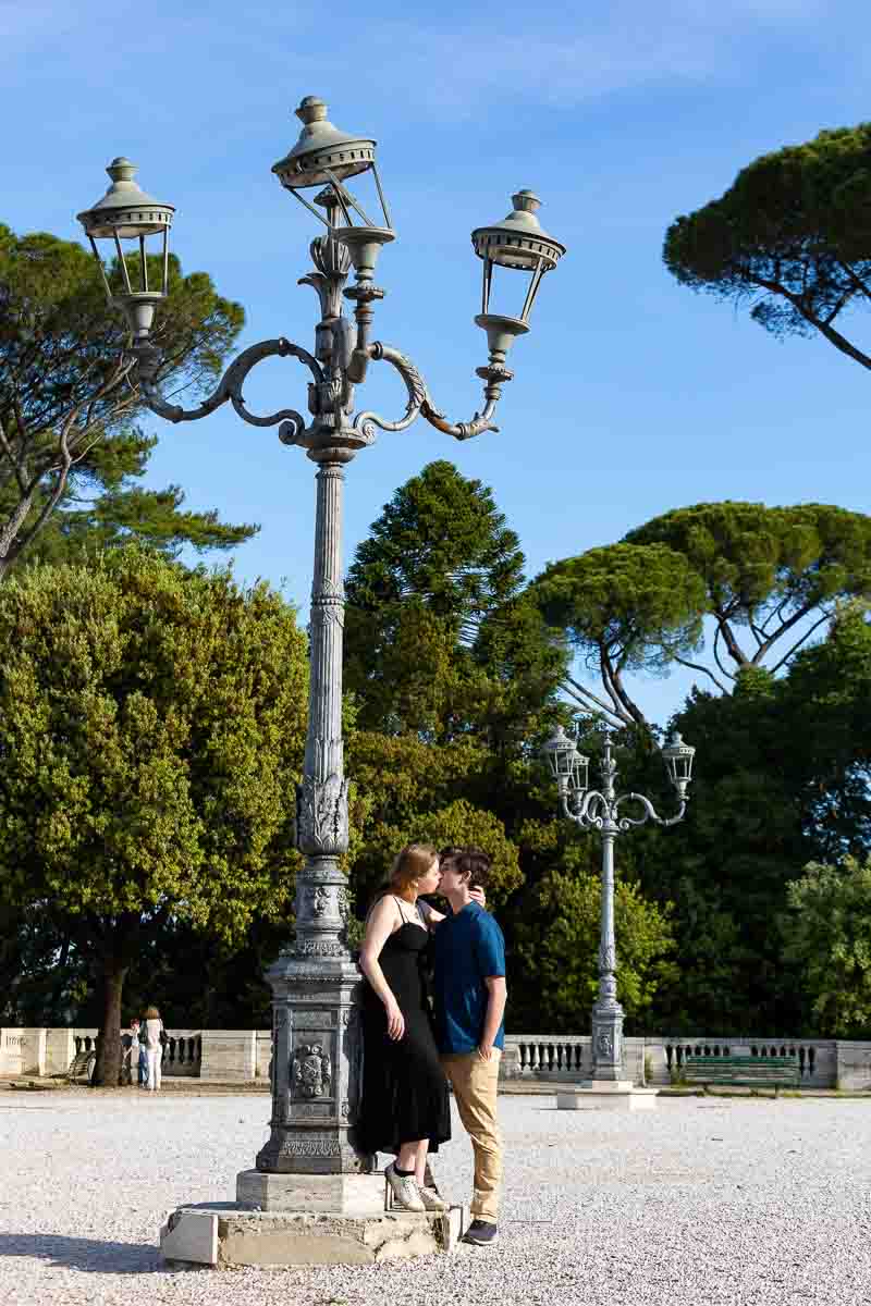 Couple kissing in the eternal city a proposal photoshoot in Rome Italy