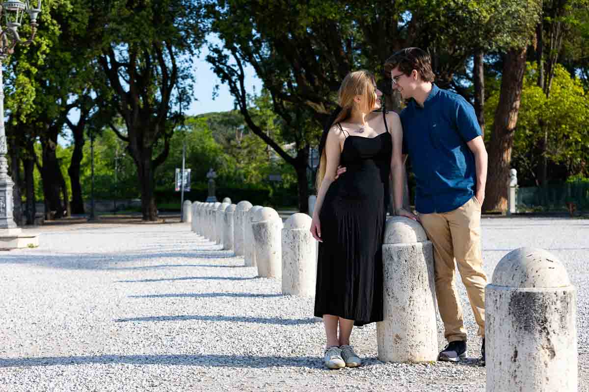 Posed shot of a couple together in Villa Borghese park