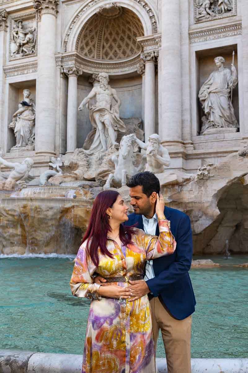 Rome Anniversary PhotoShoot posing in front of the Trevi fountain in the early morning 