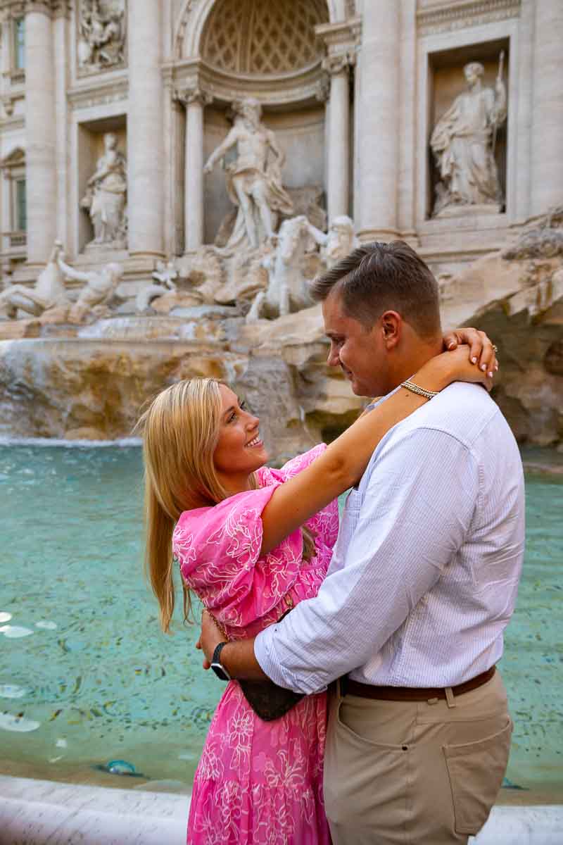 Posed portrait together in Love in Rome after a romantic Trevi fountain proposal 