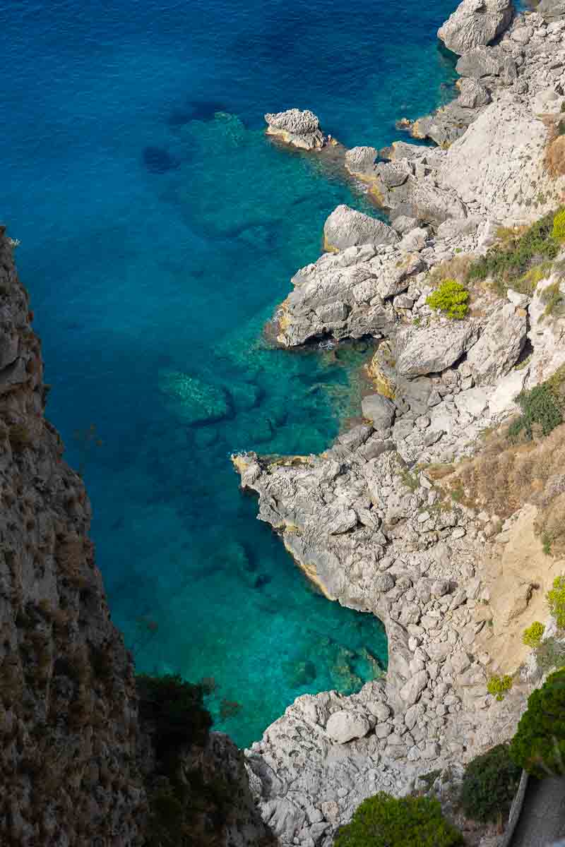 The Capri seascape seen from above with emerald green and azure amazing water colors 