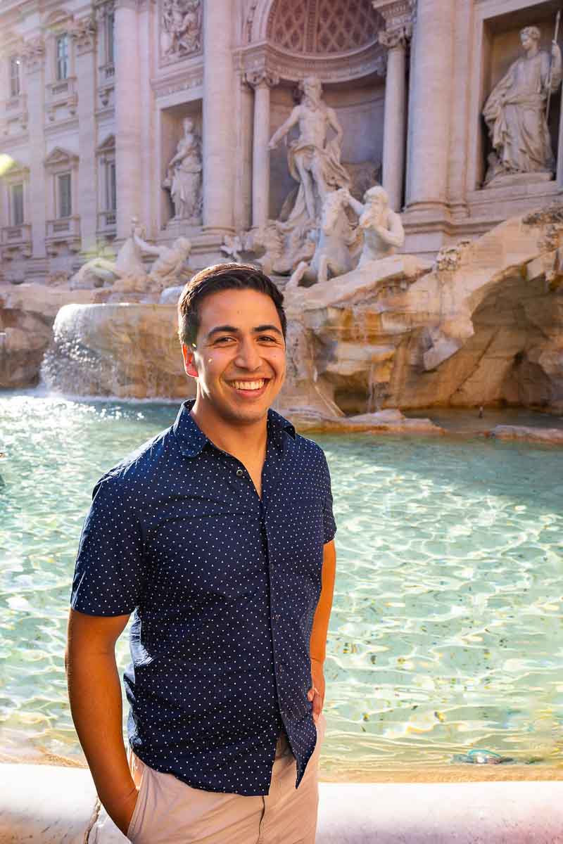 Man portrait taken at the Trevi fountain as a senior picture in Rome