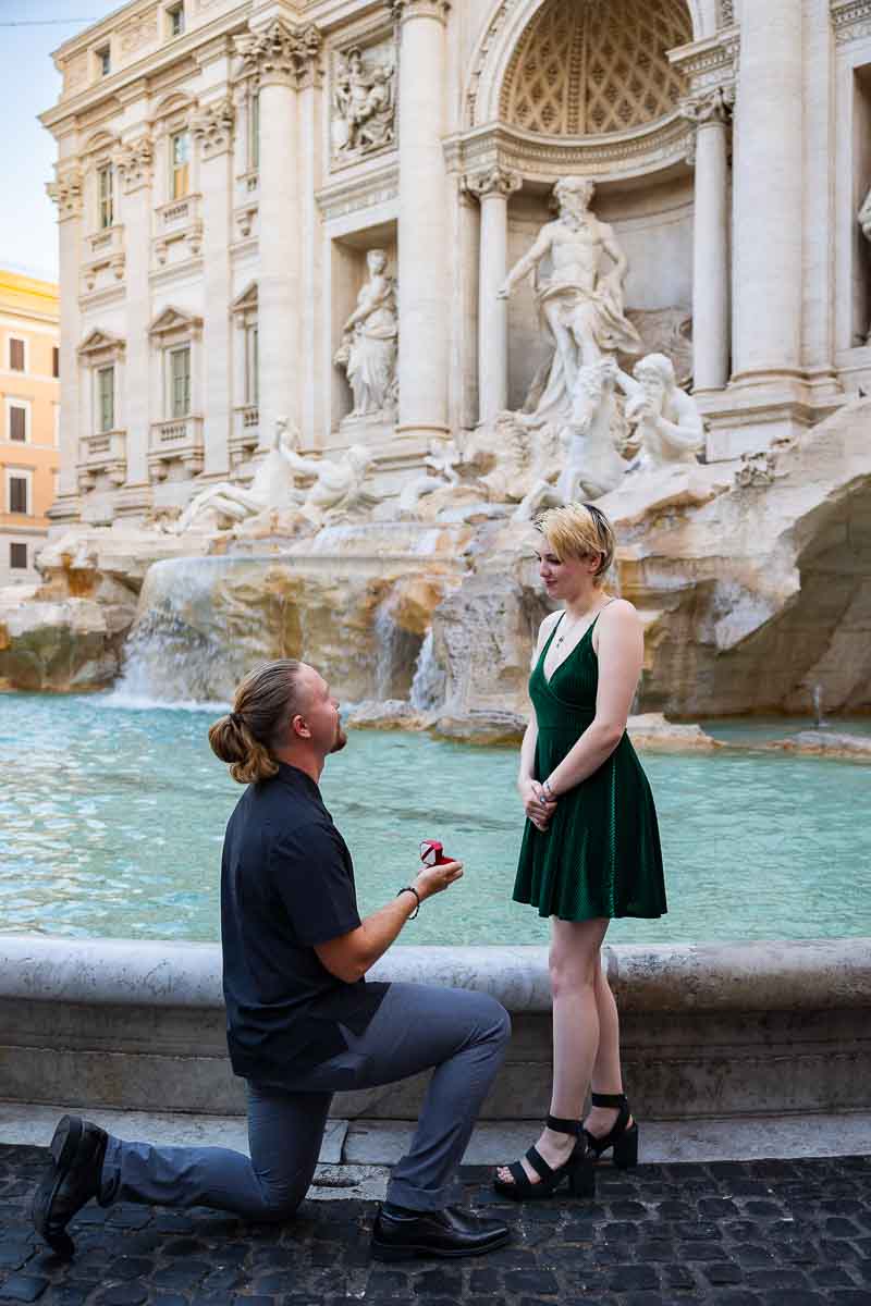 Trevi surprise wedding proposal shot in the early morning in Rome Italy