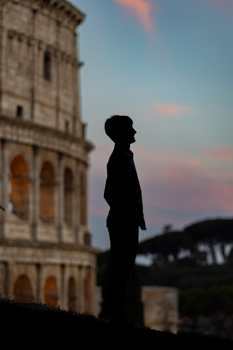 Silhouette sideway portrait at dusk in Rome's Colosseum