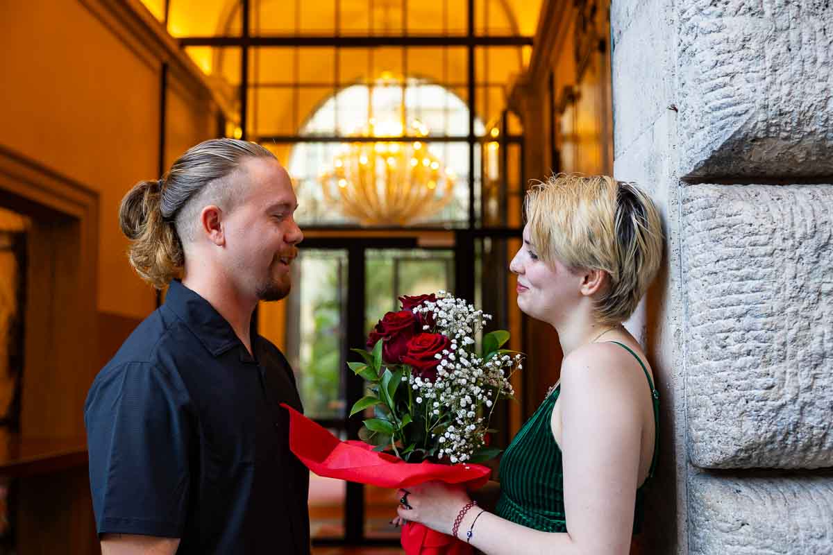 Close up couple portrait taking pictures together in the Eternal city 