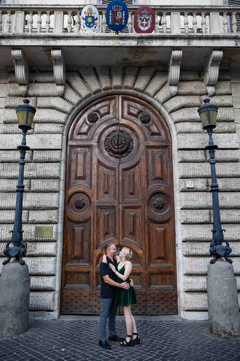 Large wooden brown door portrait found in the streets of Rome Italy 