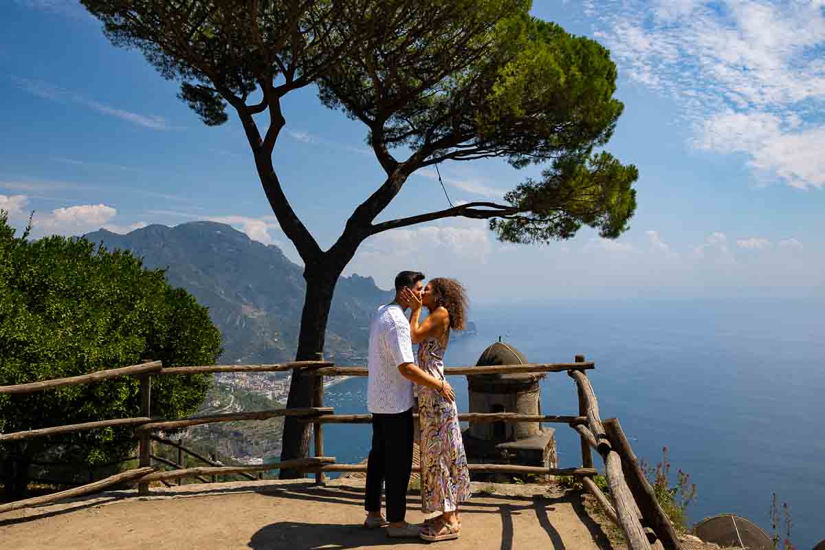 The she said yes moment perfectly photographed from a distance by a proposal photographer in Italy 