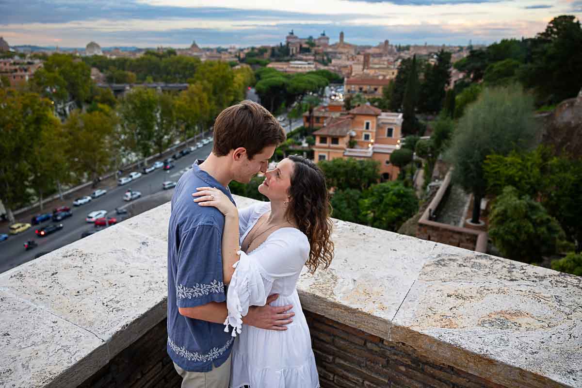 In Love in Rome photoshoot posed before the Rome cityscape 