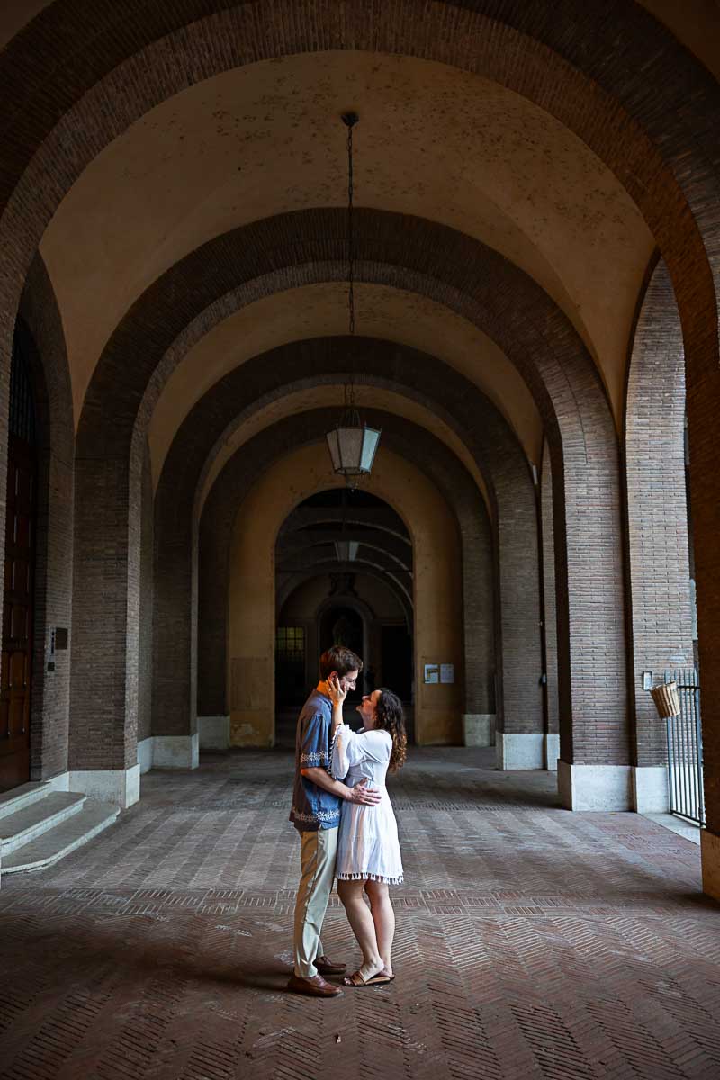 Taking pictures underneath the portico in front of the gardens 