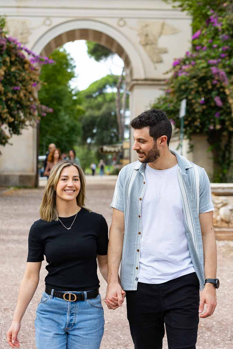 Walking together during a couple photoshoot in Rome with a professional photographer