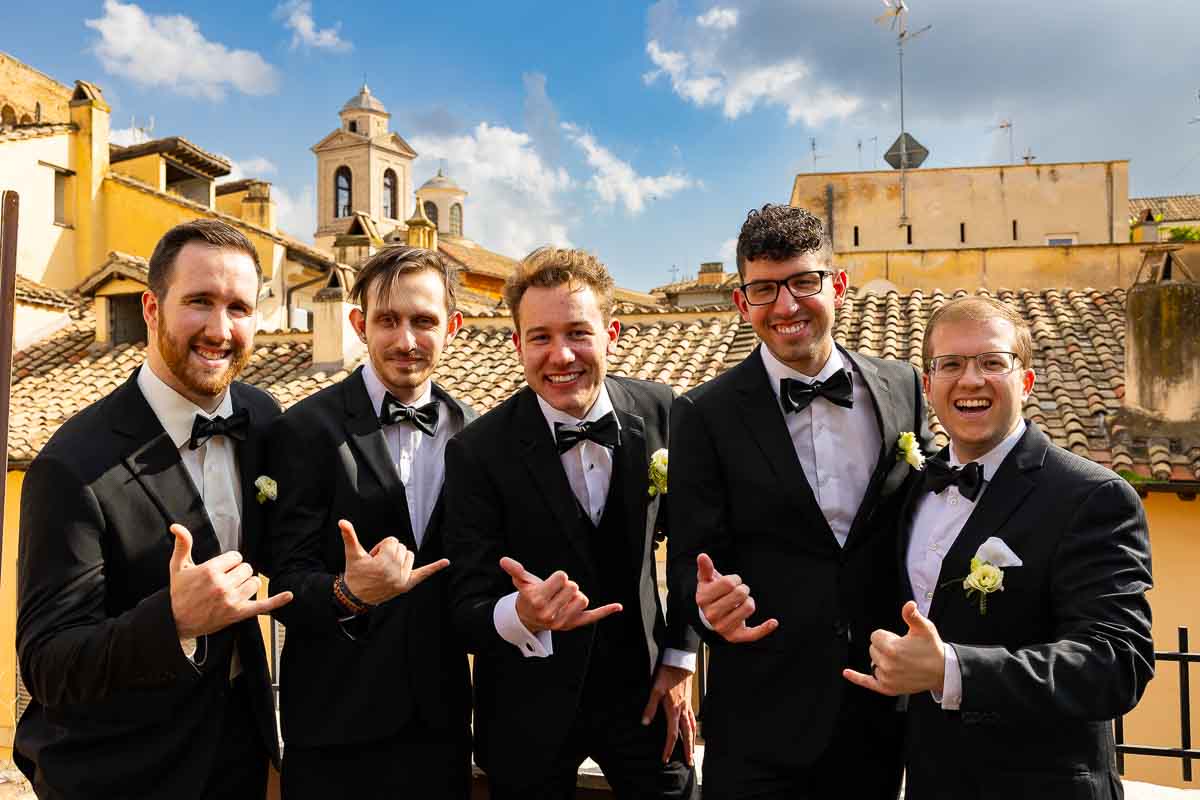 The groomsmen portrait of the guys having fun