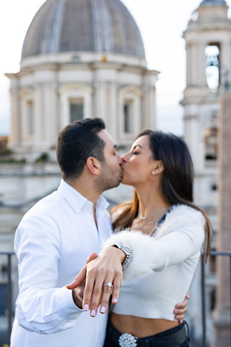 Taking engagement pictures together after asking the big question in Rome Italy